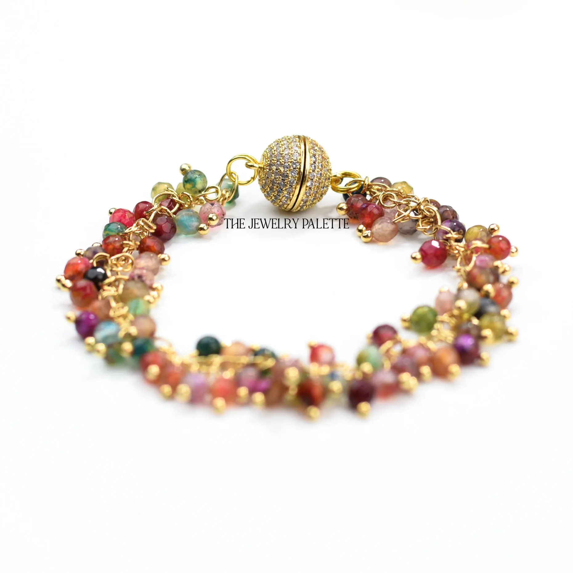 Asna multi gemstone cluster with gold edged emerald pendant