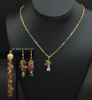 Asna multi gemstone cluster with gold edged emerald pendant