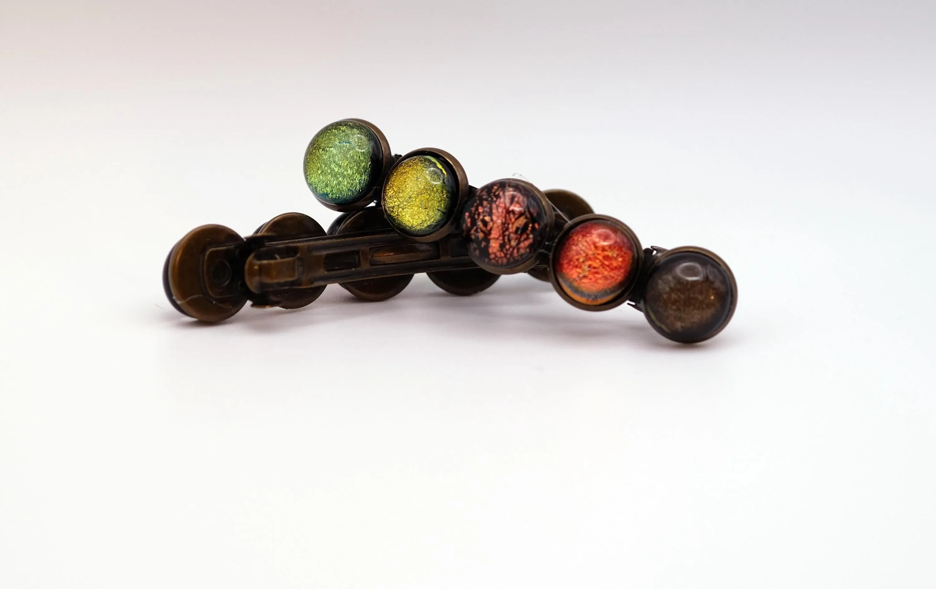 Barrette pair, bronze colored with 5 earth toned fused glass cabochons, french clip, 2 3/4 inches