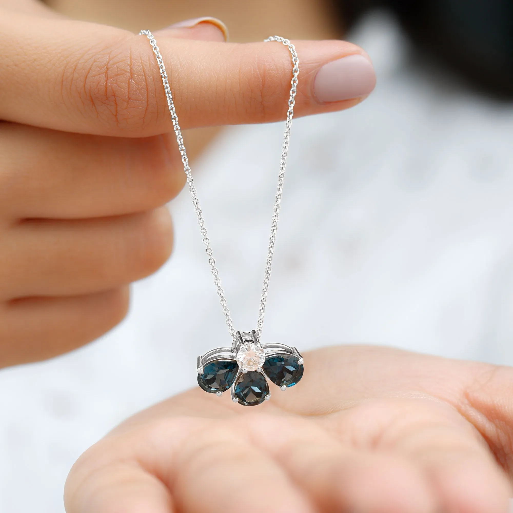 Pear Cut London Blue Topaz and Moissanite Flower Pendant