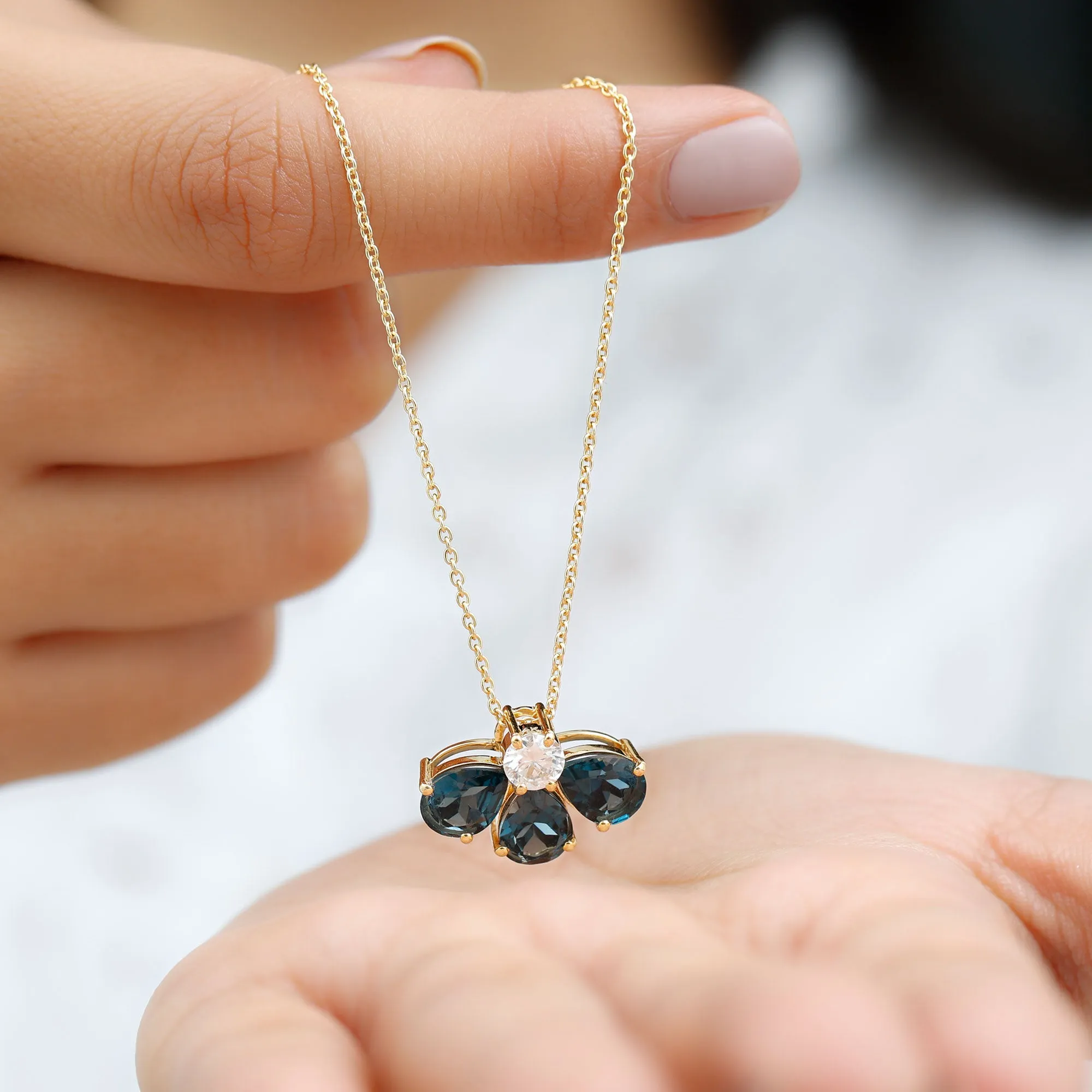 Pear Cut London Blue Topaz and Moissanite Flower Pendant