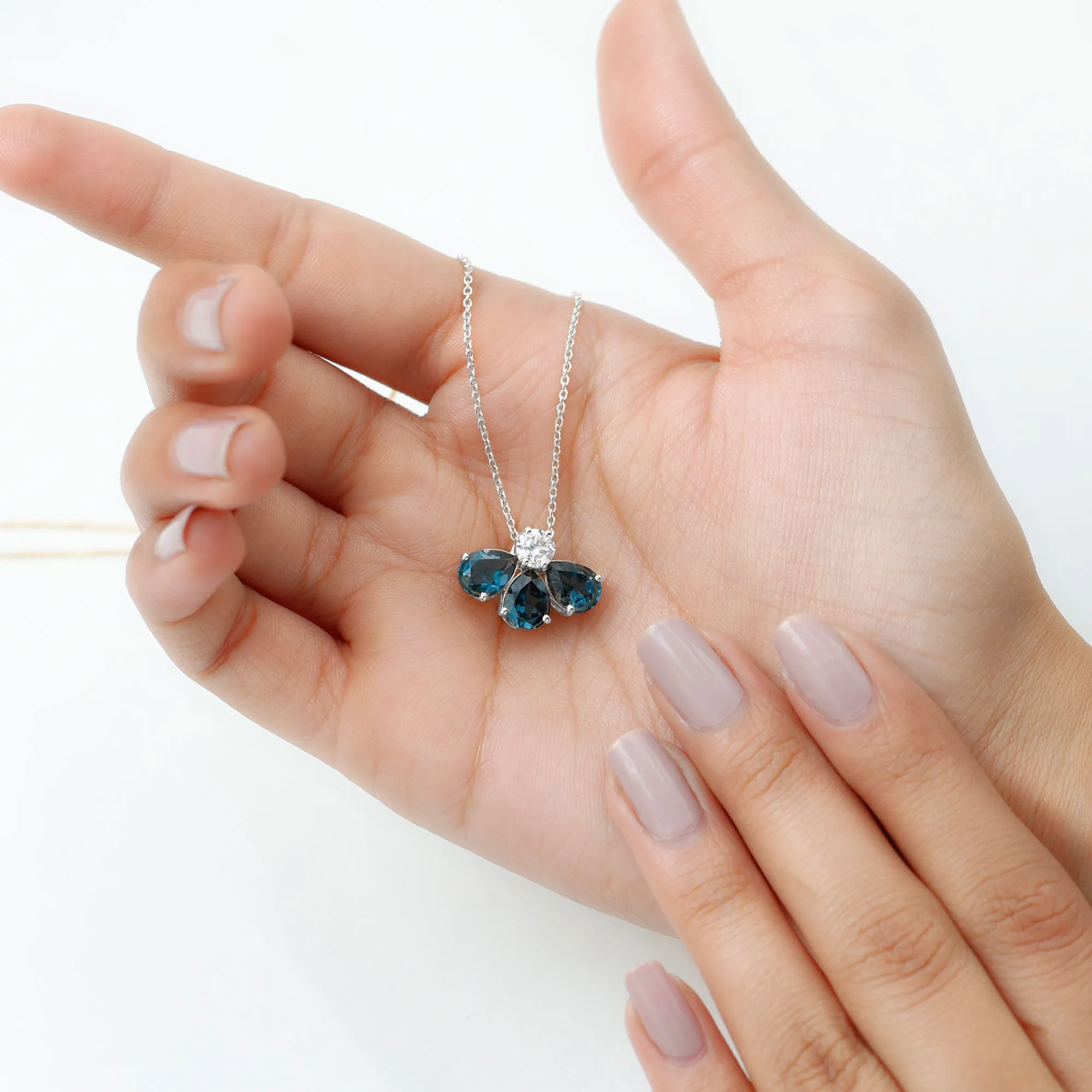 Pear Cut London Blue Topaz and Moissanite Flower Pendant